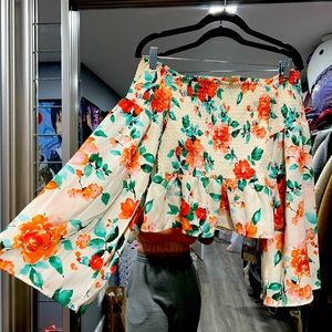 Woman’s Over-the-Shoulder Floral Blouse